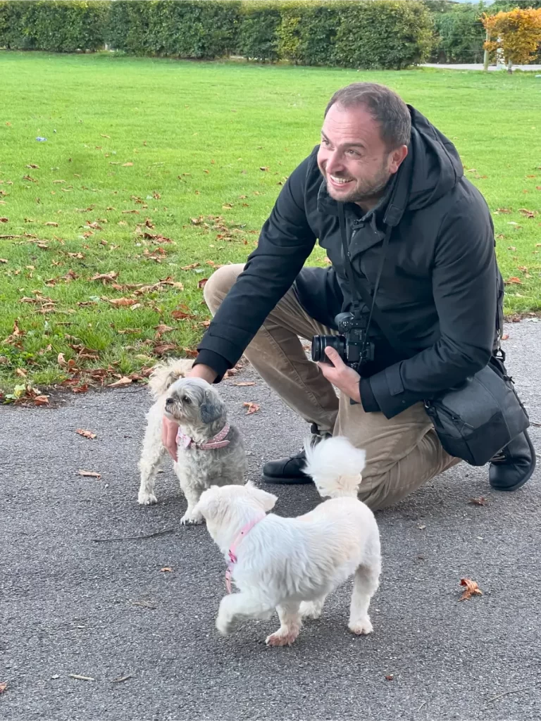 a photographer with dogs