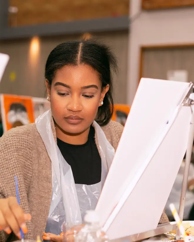 black woman painting